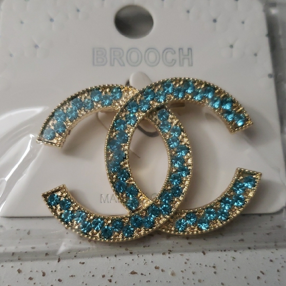 Elegant Gold and Teal Crystal Brooch